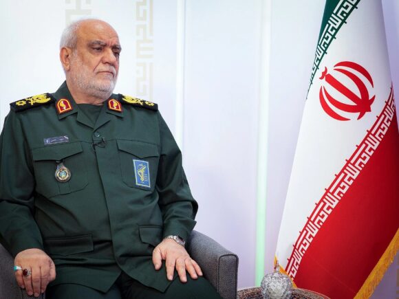 US-Israel strike has resulted in the death of the IRGC intelligence chief, prompting Iran to issue a warning of potential ‘devastating’ retaliation