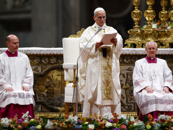 Pope Leo warns the world not to get numb to conflict during the Easter vigil