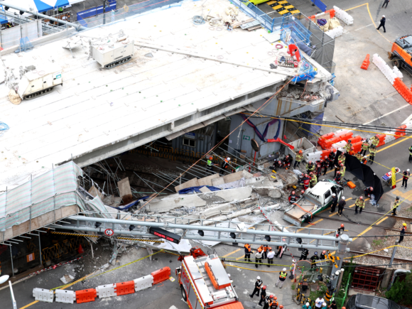 Three people died when a building site in South Korea collapsed