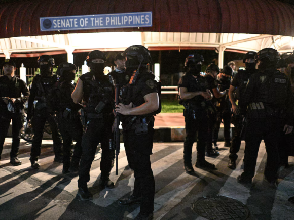 Following turmoil in the Senate, a Philippine politician sought by the ICC made a getaway.