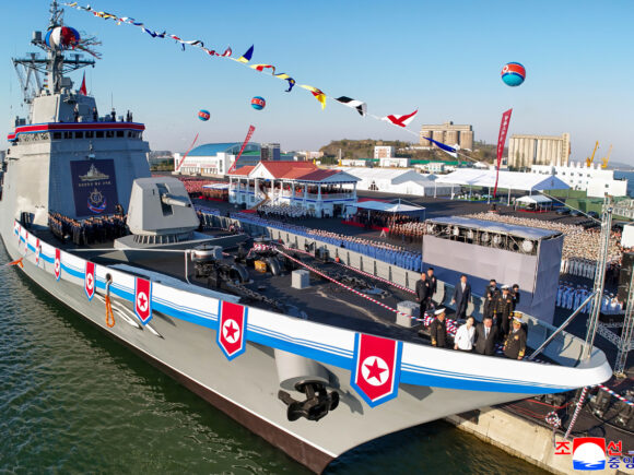North Korea Shows Off Plans For A 10,000-Ton Cruiser Ahead Of Xi’s Visit