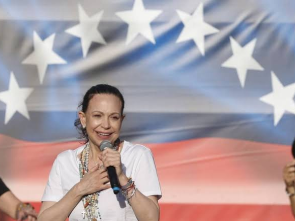 US-supported discussions regarding Venezuela are set to commence, notably in the absence of opposition leader Machado