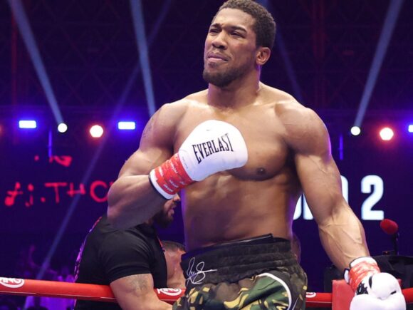 Joshua overcomes early knockdowns to secure a stoppage victory against Prenga in a remarkable comeback